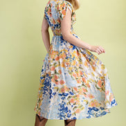 Floral Midi Dress with front zipper and smocked waist